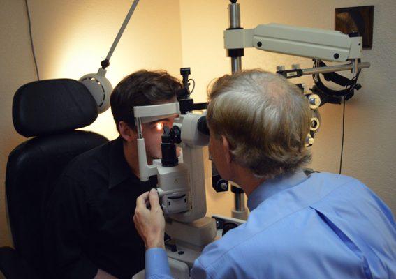 Dr. Ellis R. Jones giving a comprehensive eye exam