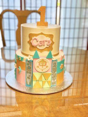 It's a Small World themed cake