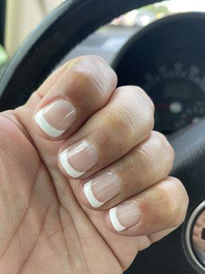 Manicure with shellac polish in French. Natural nails.