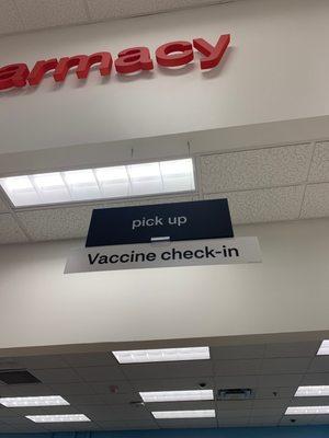 Check in at counter to the vaccine