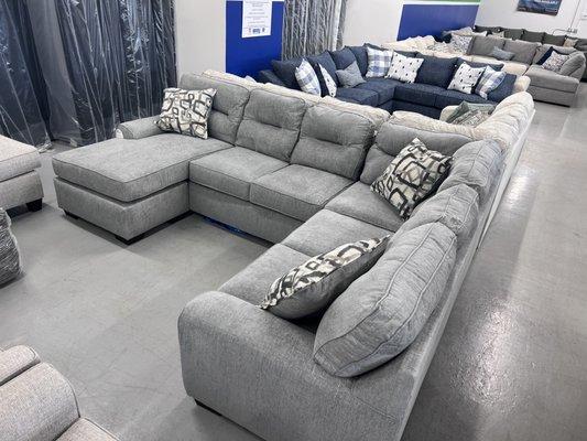 U shaped light gray sectional