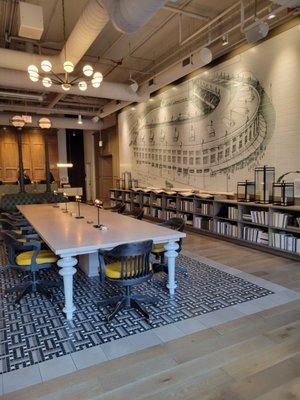 The bar area includes this beautiful table and mural of the original ballpark designed by Zachary Taylor Davis.