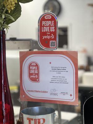 An Official 2023 People Love Us Certificate given by Yelp!