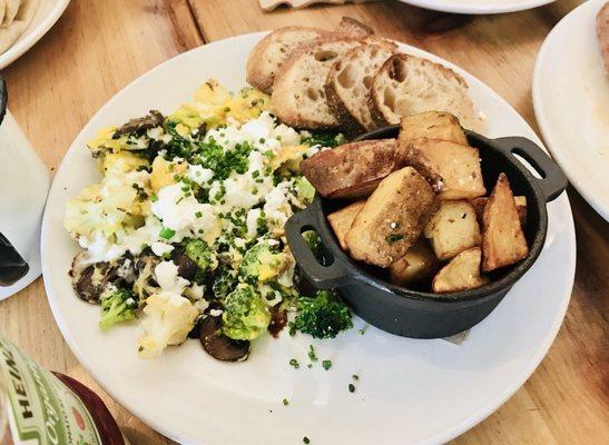 Veggie scramble with house potatoes and sourdough.