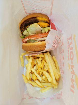 Double double with extra lettuce, grilled and raw onions and pickles. Plus fries!