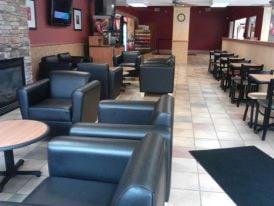 Subway @ Snowshoe/Slatyfork, WV lounge area with fireplace and 2 large flatscreen t.v.s & free wifi hotspot