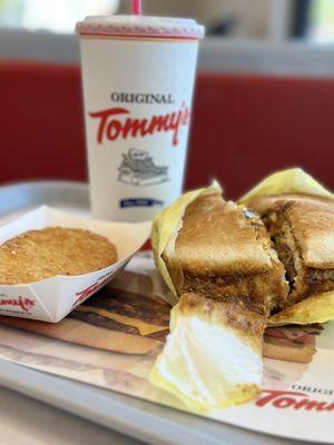 Sausage and Egg Sandwich with Cheese, hash brown, and fizzy Diet Pepsi