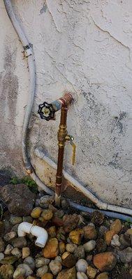 Replaced old gate valve on main water shut off with new ball valve and hose bib..