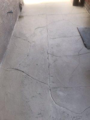 Attempted natural stone look grinded into cement