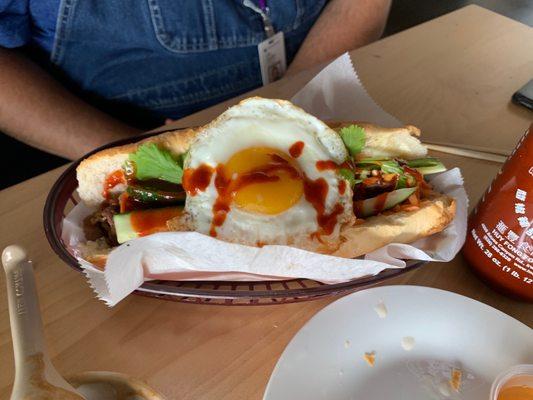 Banh Mi with fried egg and sriracha