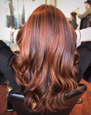 This beautiful color is achieved by hand painting with a process called balayage. It's a painstaking process and Bryan's a real artist.