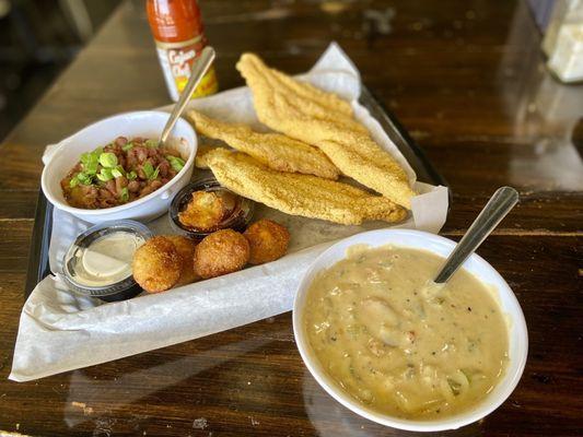 Fried catfish basket with a bowl of Cajun crawfish chowder