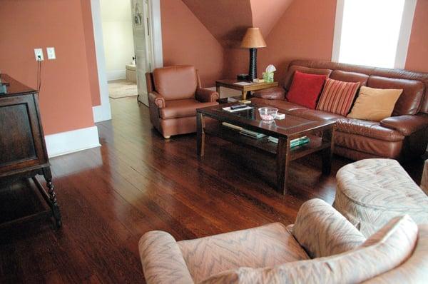 Shared sitting room with TV, Microwave and refrigerator.