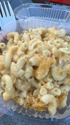 Mac & cheese. Seasoned well and creamy, cheesy yumminess on your palette.