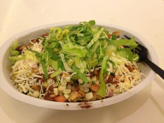 This is the chicken burrito bowl with all the toppings, minus the guacamole (which is homemade), but really good.