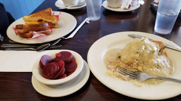 Cheddar bacon tomato (CBT) grilled cheese sandwich, pickled beets, chicken and waffle.