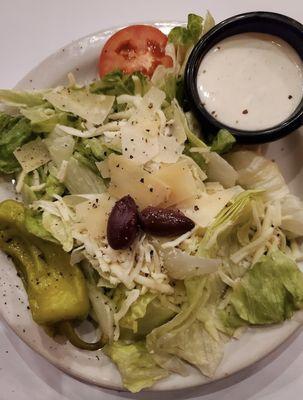 They brought out a very good sized house salad. The olives and peppers were a good addition.