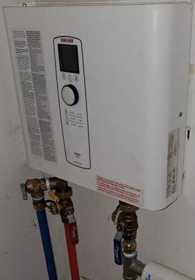 Tankless, instant hot water and reclaim space in your house