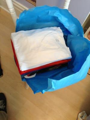 wash and fold service. wrapped in blue tissue paper like a piece of Chinese pastry :)