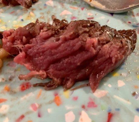 Perfect rare bite of "ugly" steak.