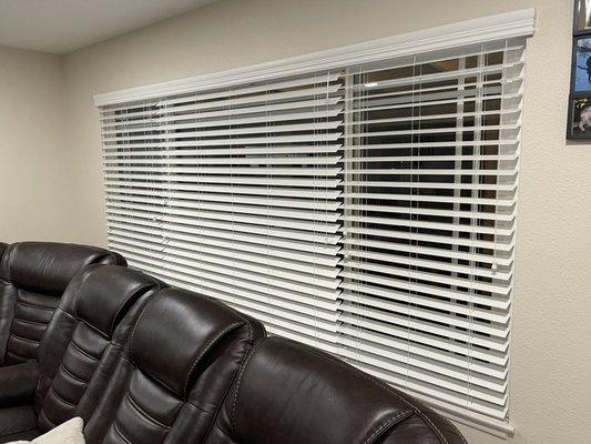 Installation of a divided 3 section blind.