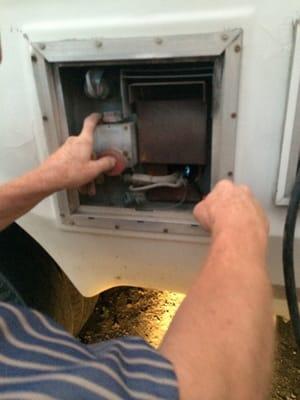 Teaching us to use the water heater and light the pilot light