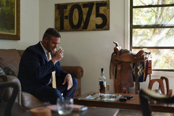 From the website: "A relaxed groom takes a sip in our rustic Groom's Room."