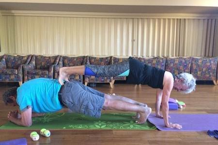 Partner yoga at Kat's class at the Hilltop Center.