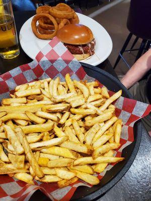 An order of fries & a pizza burger w/onion rings @ Marys Hideaway in Johnsburg...