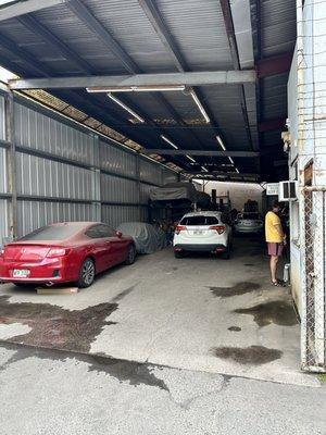 Inside the garage, office is to the right.