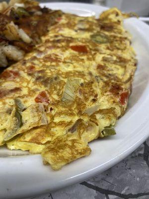 Tex-Mex Omelette $11.95 Onion, tomatoes, jalapenos, and cheese.