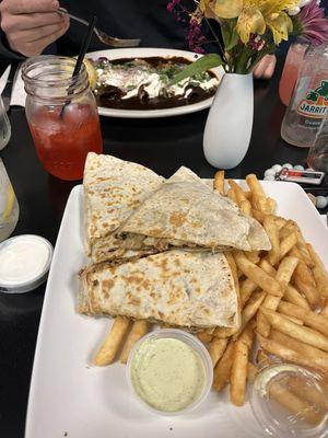 Chicken quesadilla and enmoladas