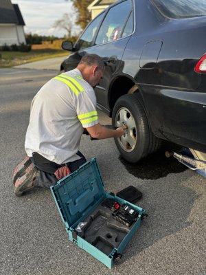 Putting the tire back on after completing the job