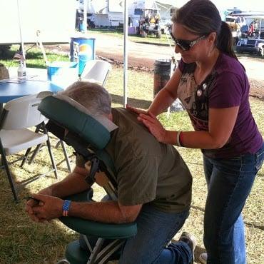 Doing chair massage at the Vietnam Veterns Outreach