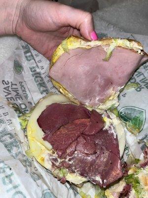 2 slices of meat on a 6inch $16 sandwich