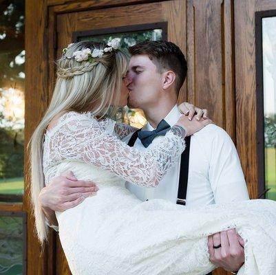 The hair of the Bride and Groom were both done at Kreations.