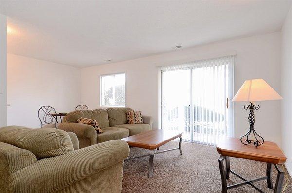 Large walk-out living room with plenty of space for various sizes of furniture