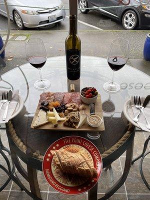 Charcuterie for two! Excellent bites to go with the red blend.