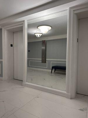 Elevator Lobby Mirror with Cutout for Buttons