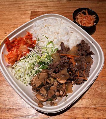 soy ginger beef with kimchi, marinated mushrooms, green onion salad + side of spicy daikon