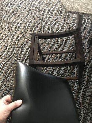 Brand new chair in room, not even attached