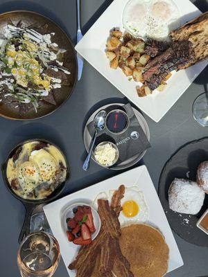 Weekend Brunch - salmon hash, pancakes, bacon & eggs, fruit dish, steak & eggs, chilaquiles