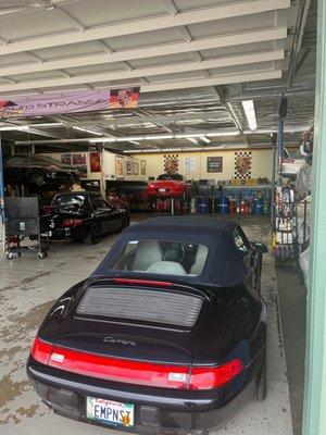 Boxster being looked at for oil leak and paint inspection among other things.