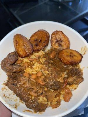 Chivo (Saturday Only) with rice, beans and Maduros/sweet plantains