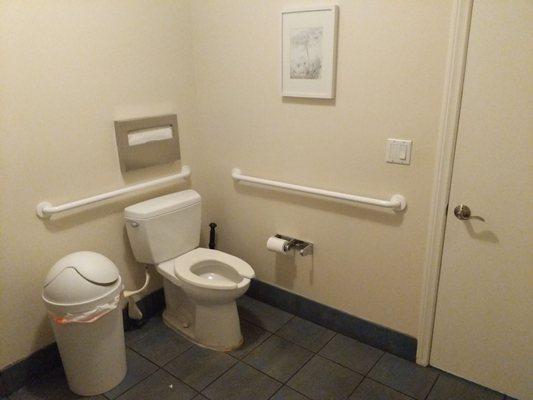 View of restroom and restroom door.