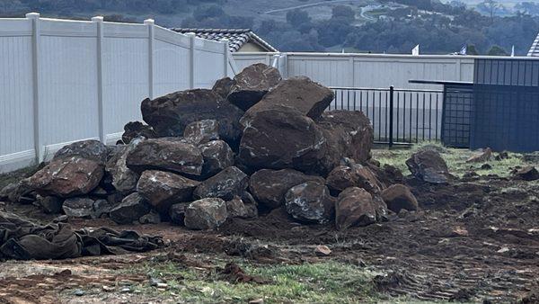 Boulders from our back yard. All repurposed throughout our design.