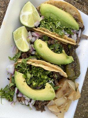 Lengua and carne asada tacos