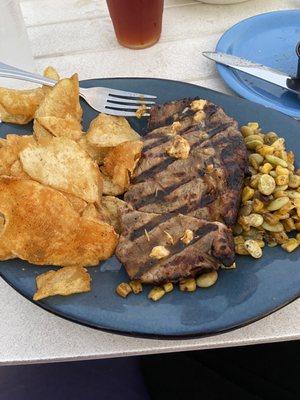 Medium well steak, when asked for medium rare, chips and succotash