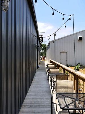 Exterior side seating area at the TASTING ROOM in Travelers Rest, South Carolina.