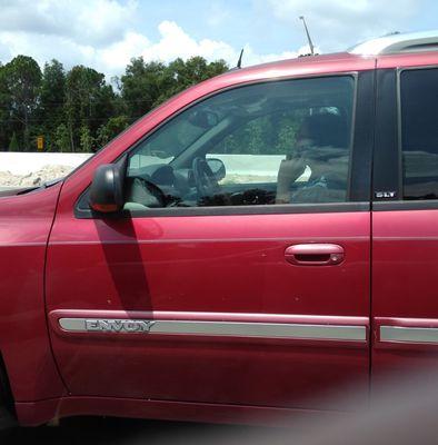 Cellphone user on I-4 West. She almost drove us off the road and on top of that she didn't use her blinker because s if occupied hands.